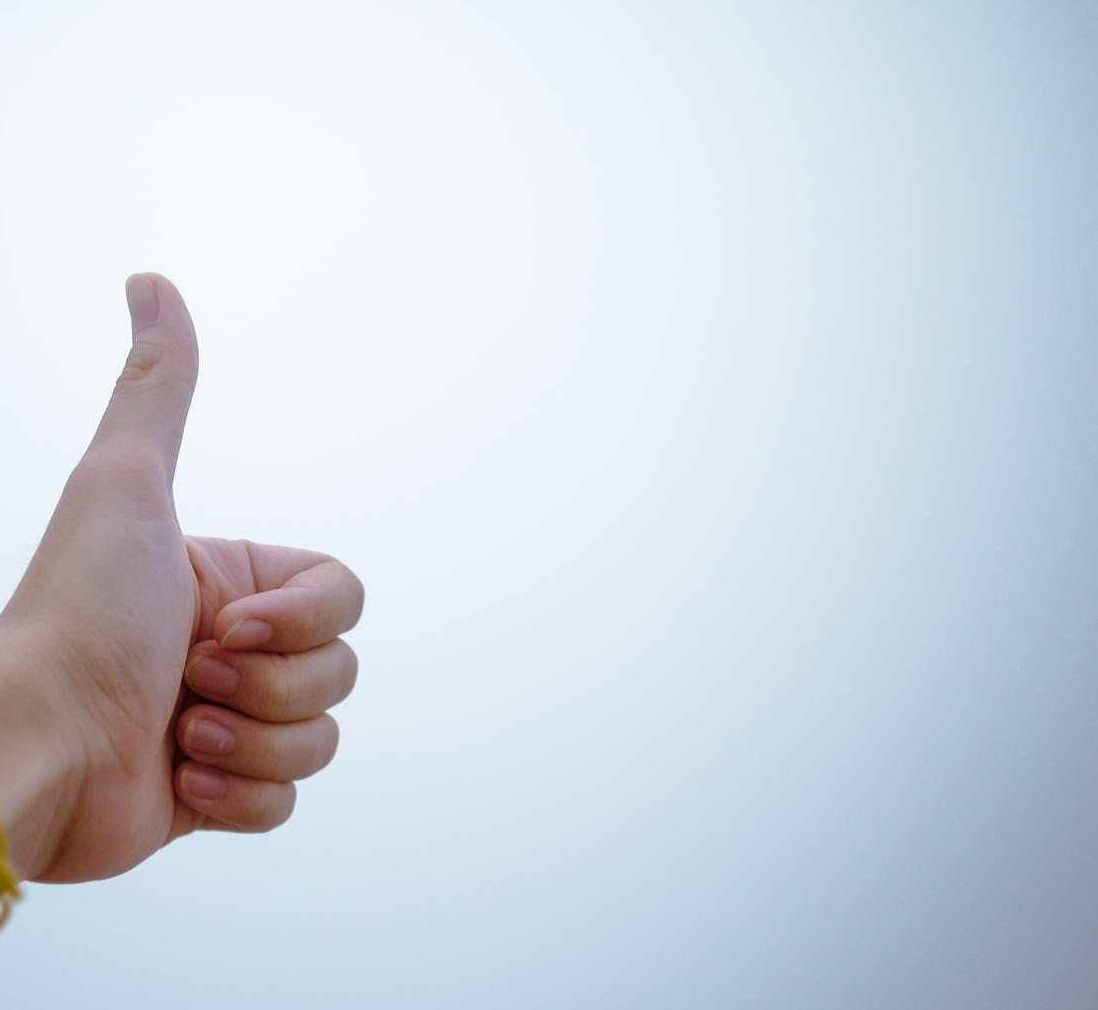 person doing thumbs up